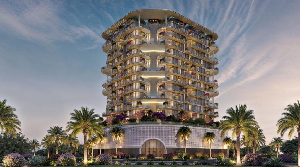 Residential tower surrounded by palm trees at dusk